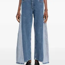 Джинсы со вставками и бахромой