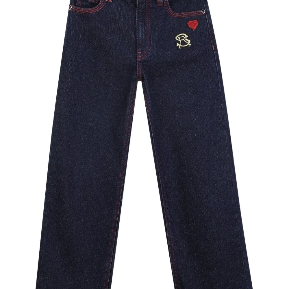 джинсы с вышивкой