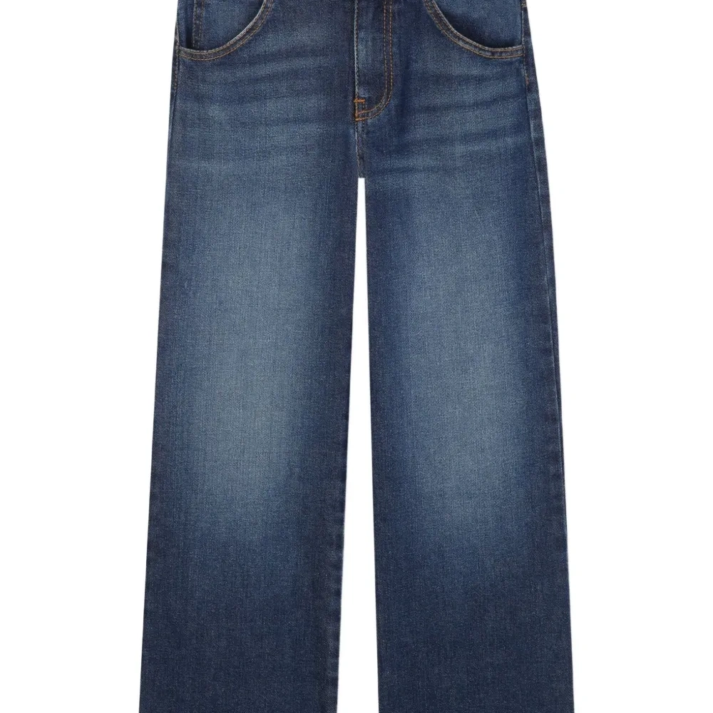 джинсы с эффектом потертости