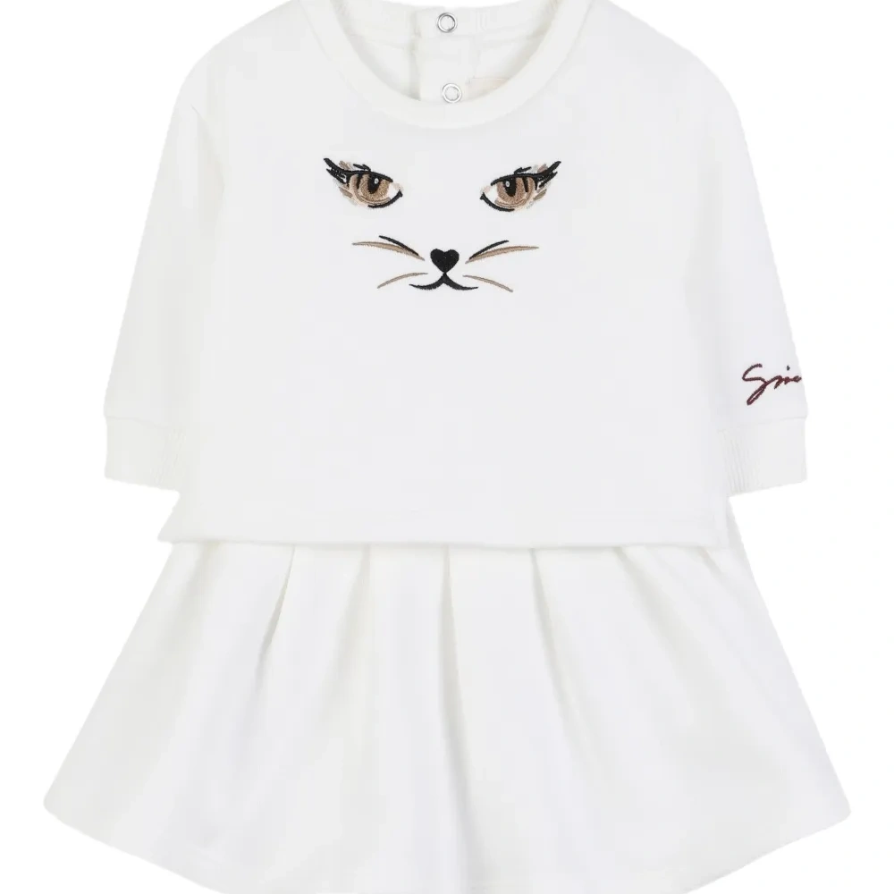 Многослойное платье с вышивкой