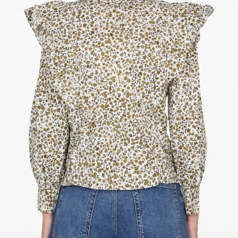 Блузка с оборками и цветочным принтом