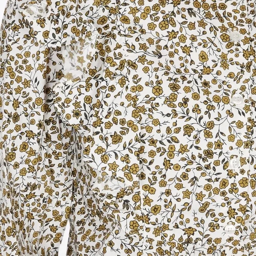 Блузка с оборками и цветочным принтом