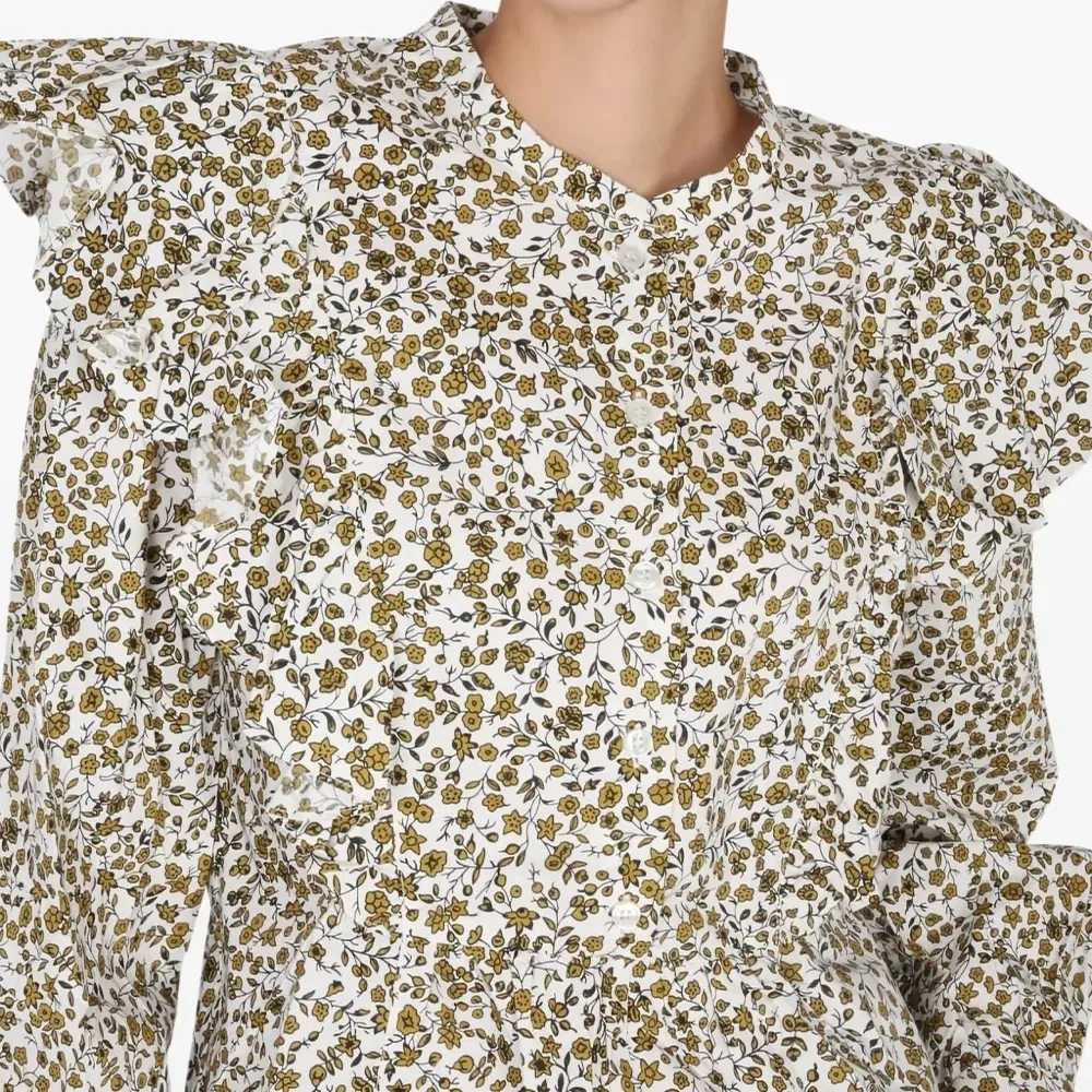 Блузка с оборками и цветочным принтом