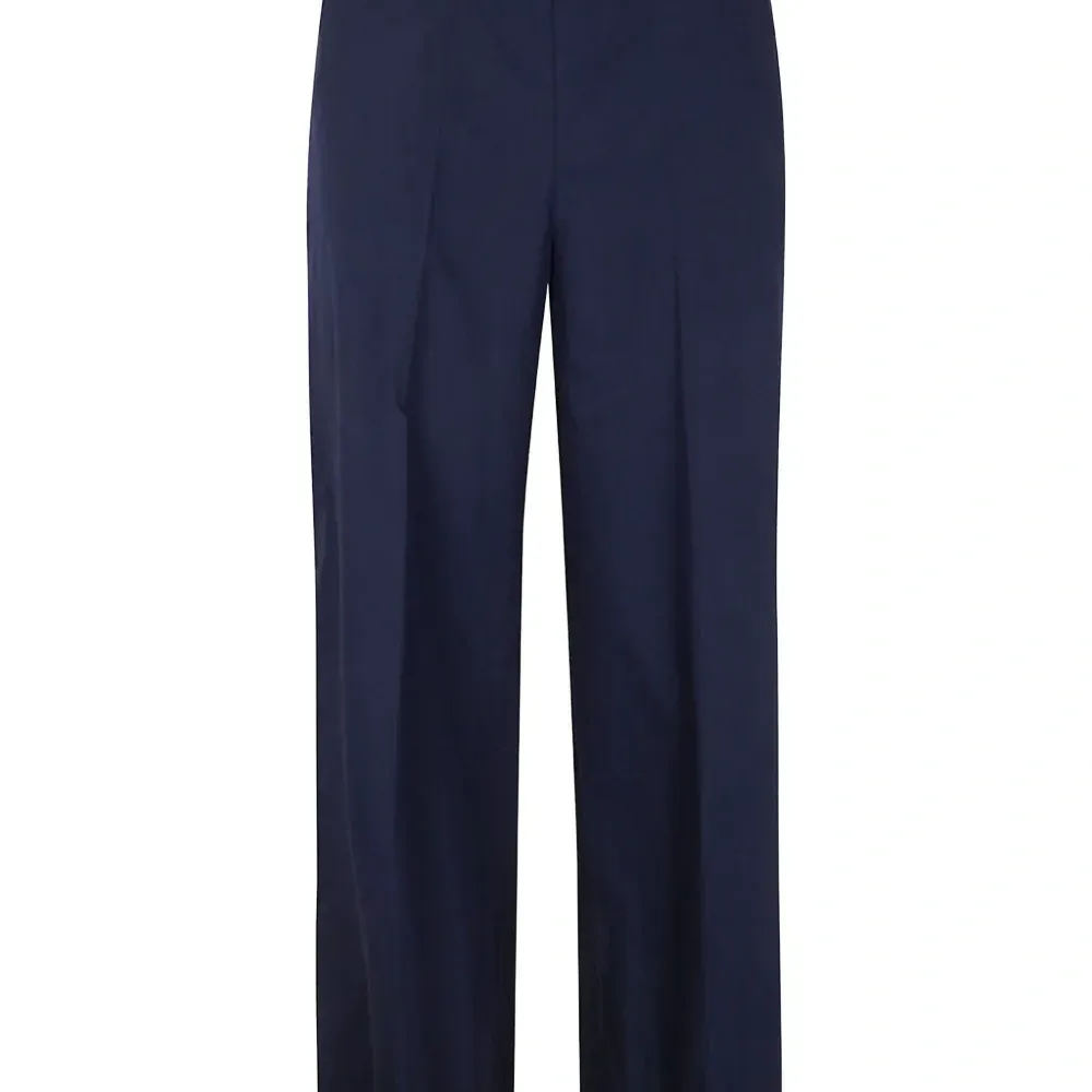 Плиссированные брюки