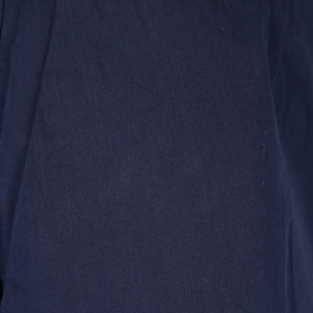 Плиссированные брюки