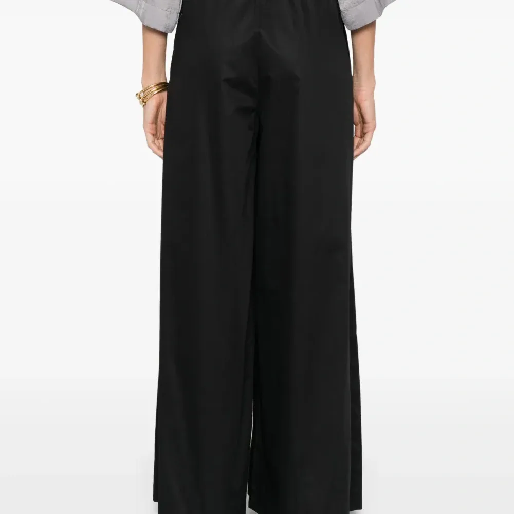 Брюки с карманами