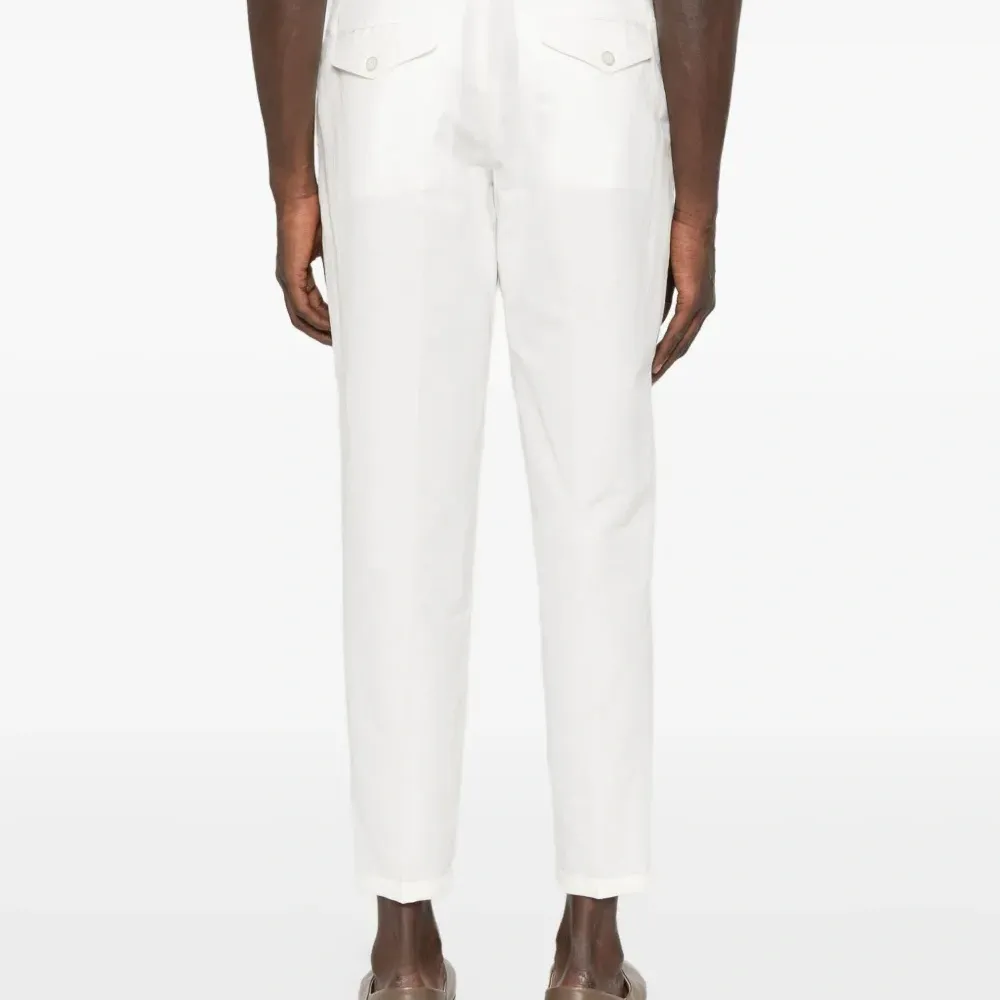 Брюки на пуговицах