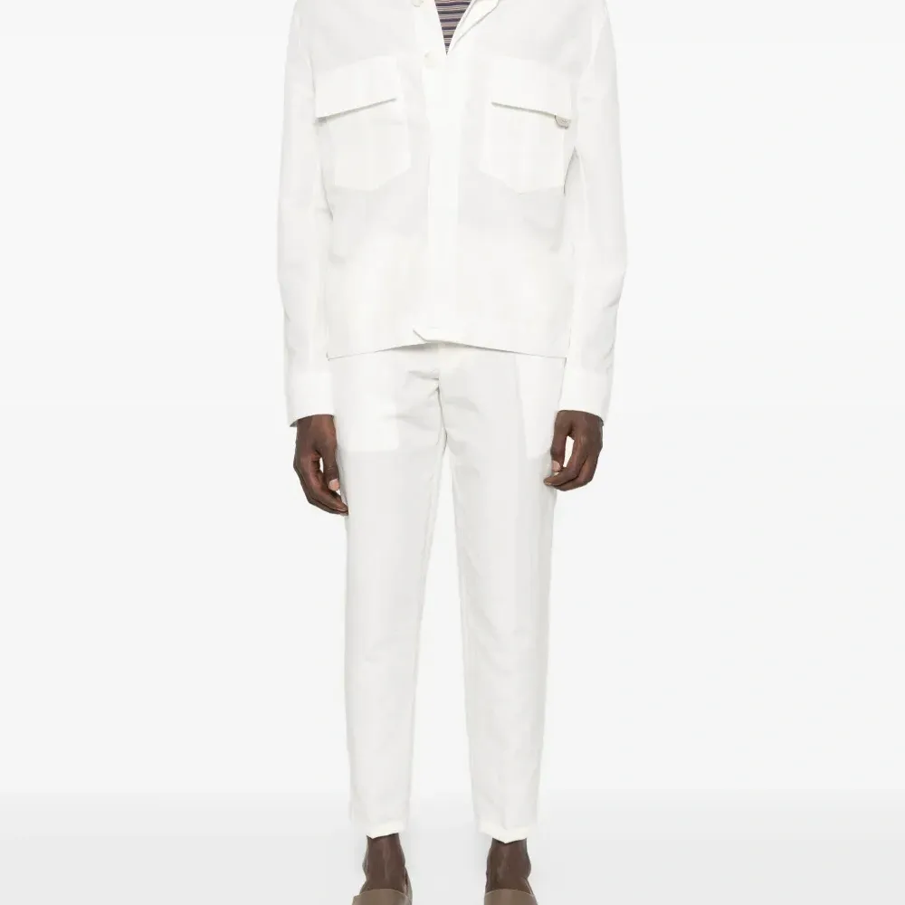 Брюки на пуговицах