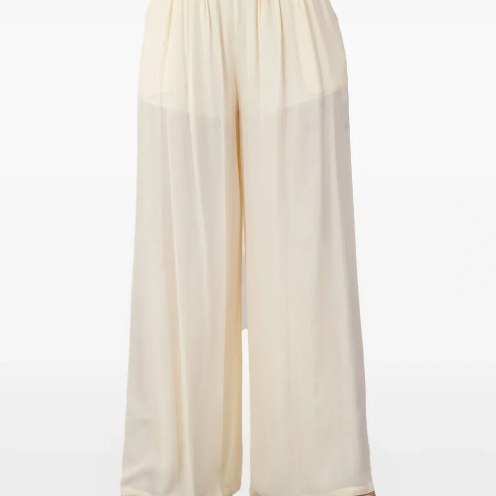 полупрозрачные брюки со складками