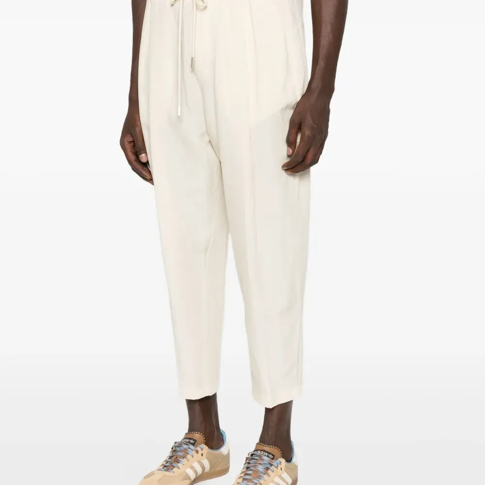 Брюки с кулиской и складками