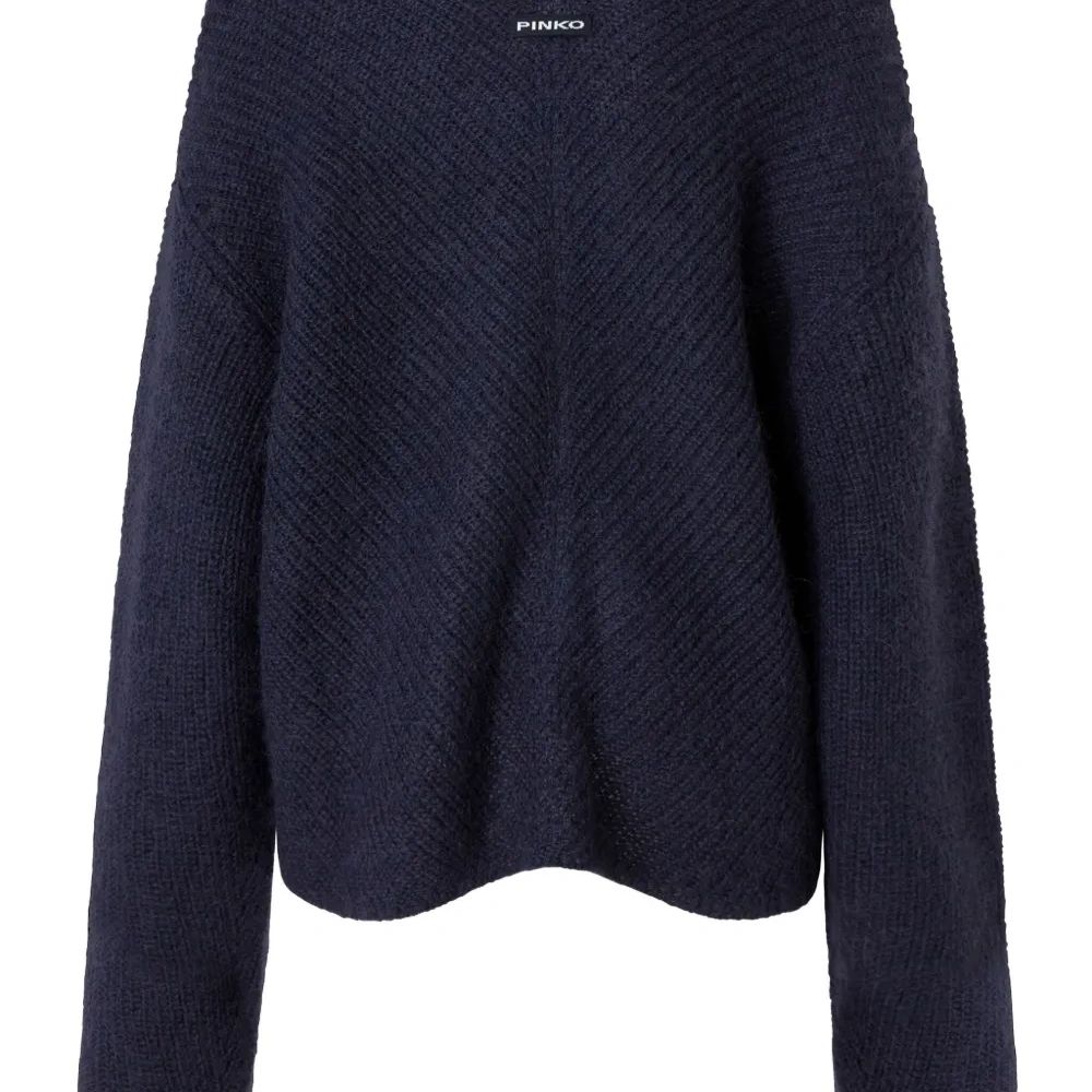 Джемпер с V-образным вырезом и узором в елочку