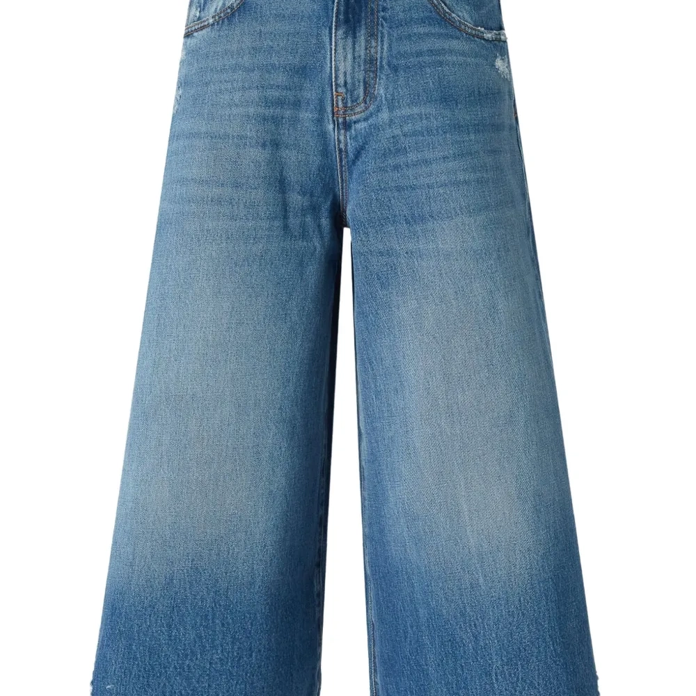 Джинсы с бахромой