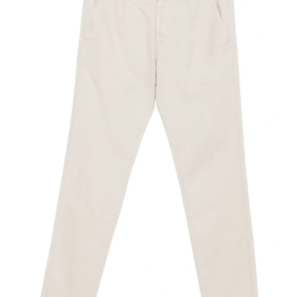 Брюки с защипами