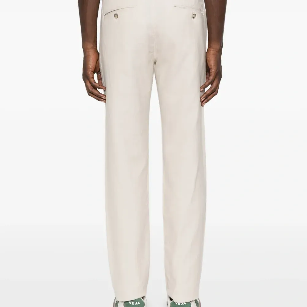 Брюки с защипами