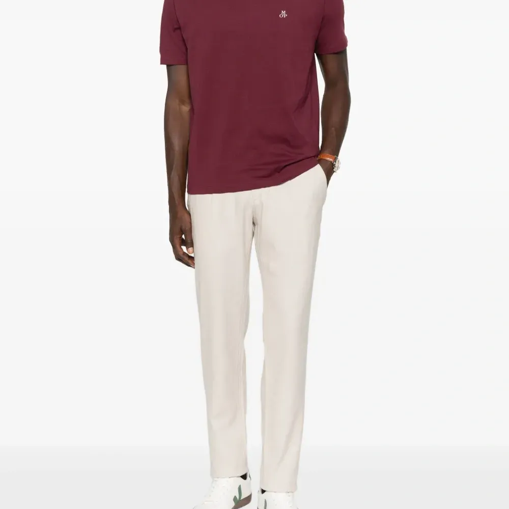 Брюки с защипами