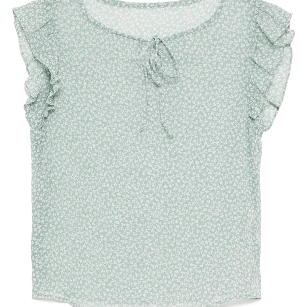 Блузка с оборками и принтом