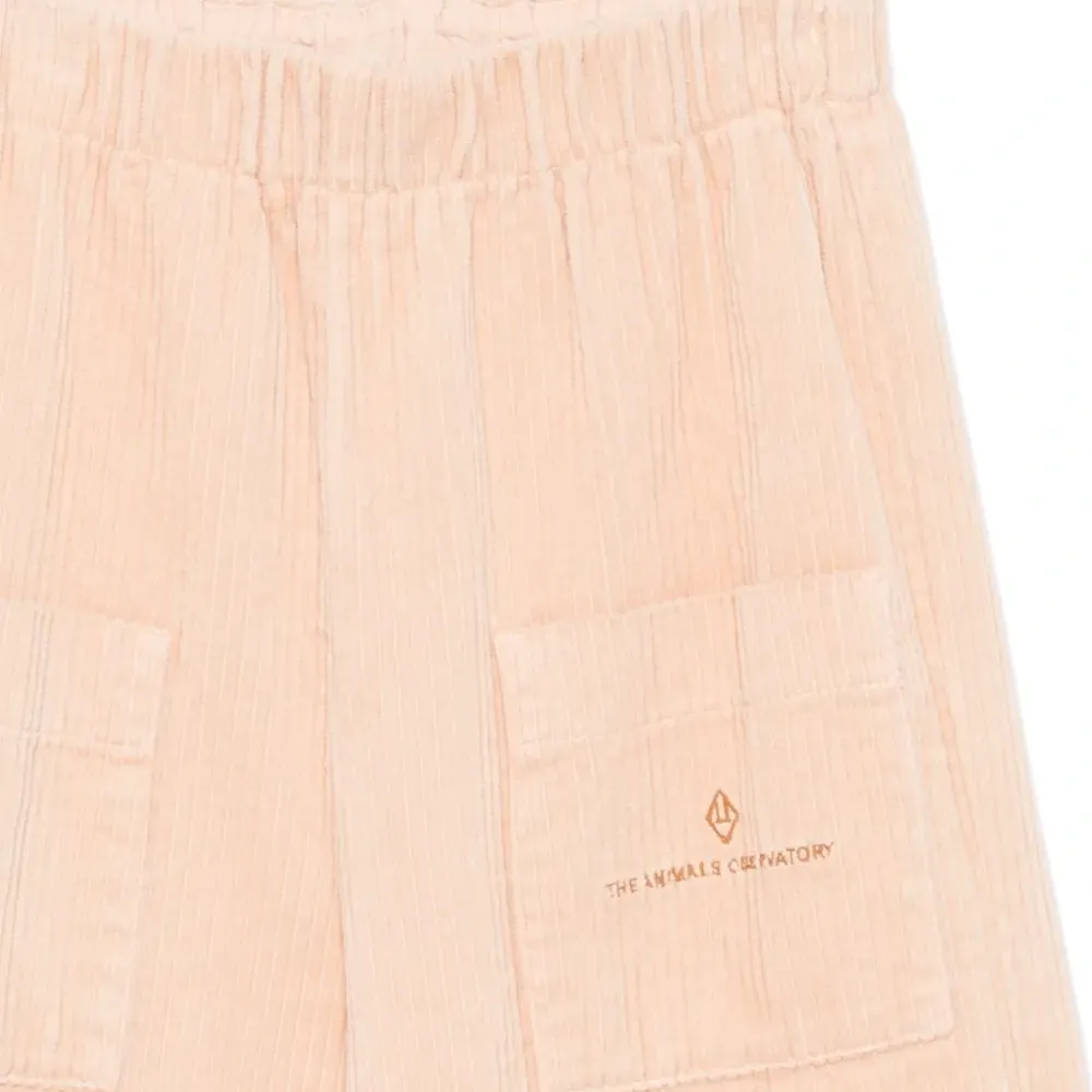 Брюки с накладными карманами Брюки с накладными карманами