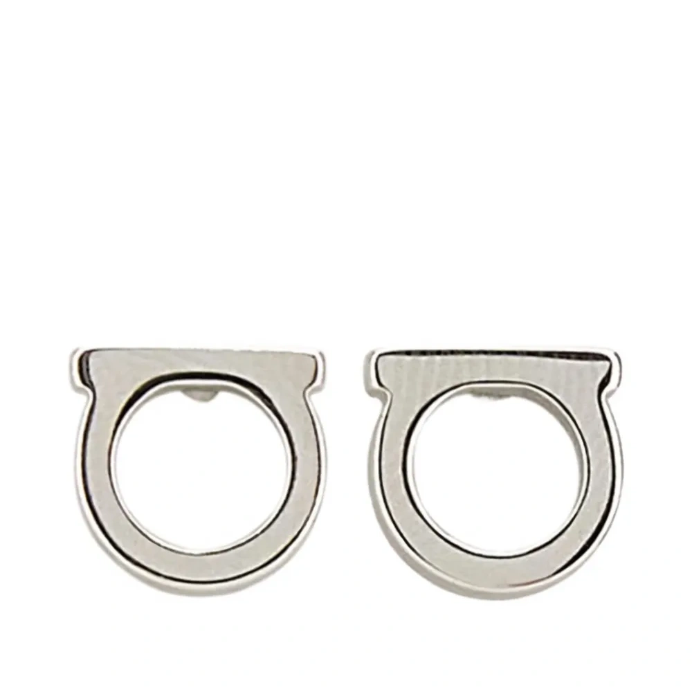 Серьги-гвоздики с декором Gancini