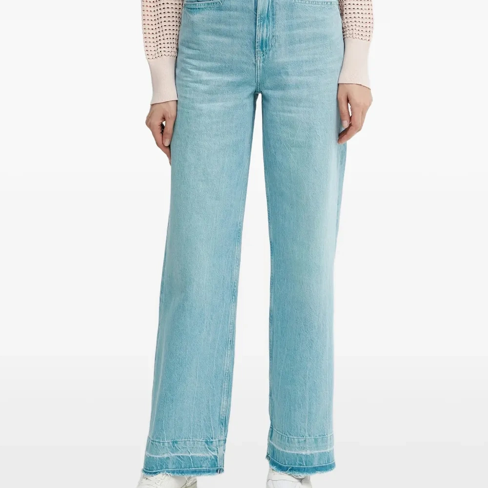 Джинсы с бахромой