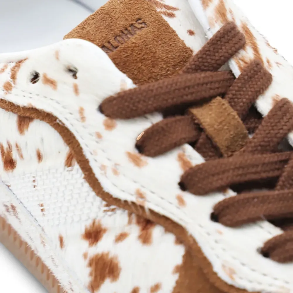 Кроссовки с анималистичным принтом