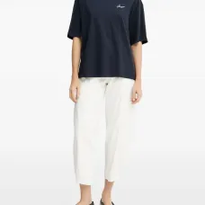 Джинсы с накладными карманами