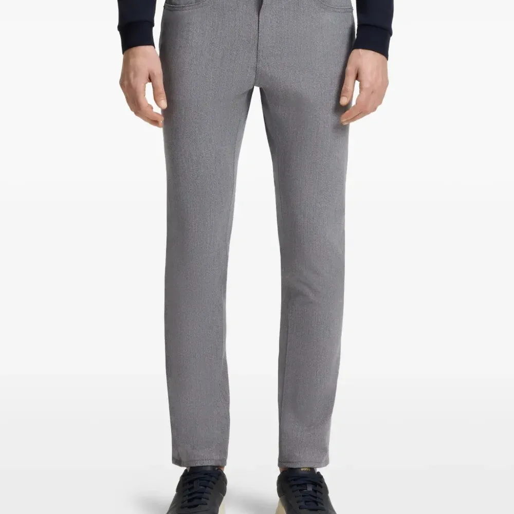 меланжевые брюки узкого кроя