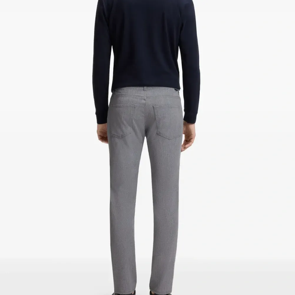 меланжевые брюки узкого кроя