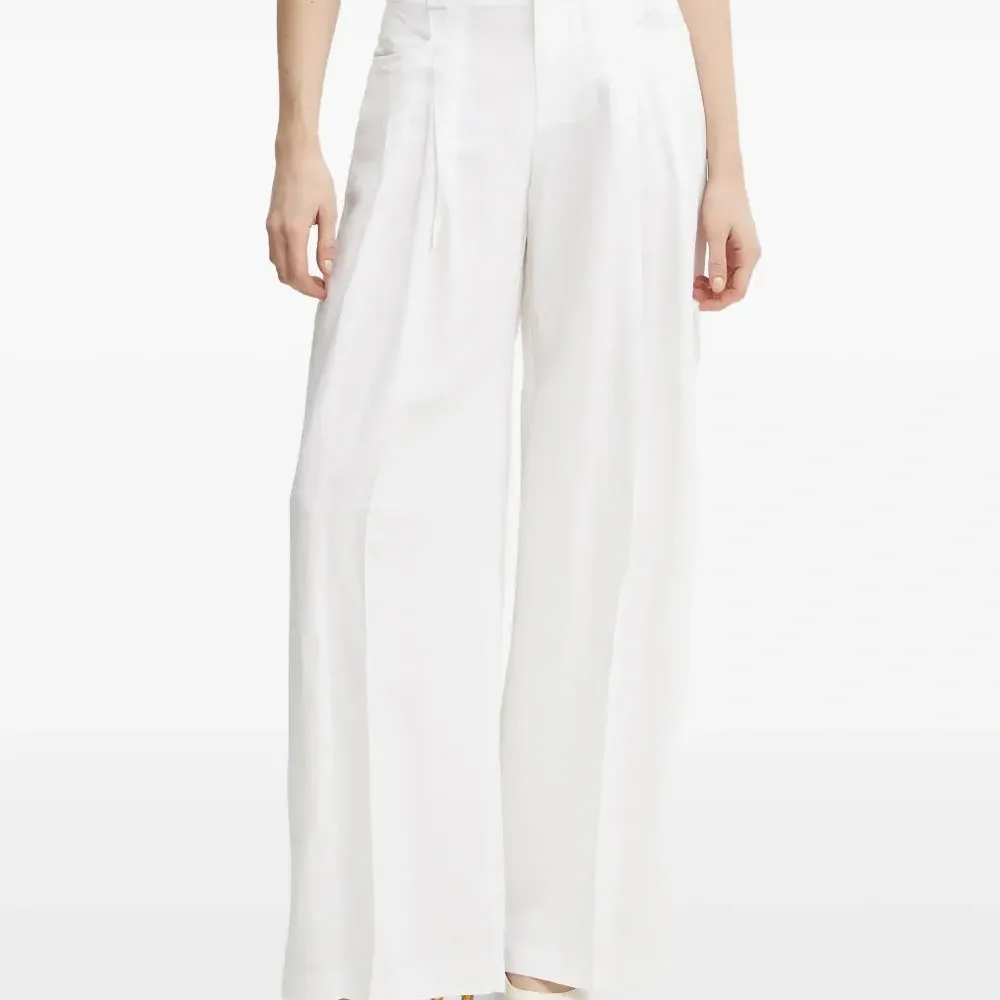 Брюки со складками