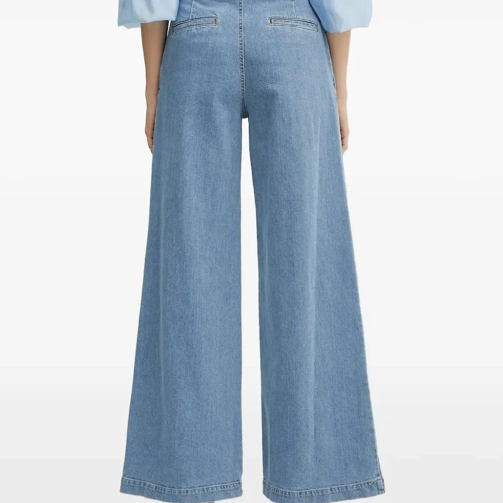 Джинсы со складками