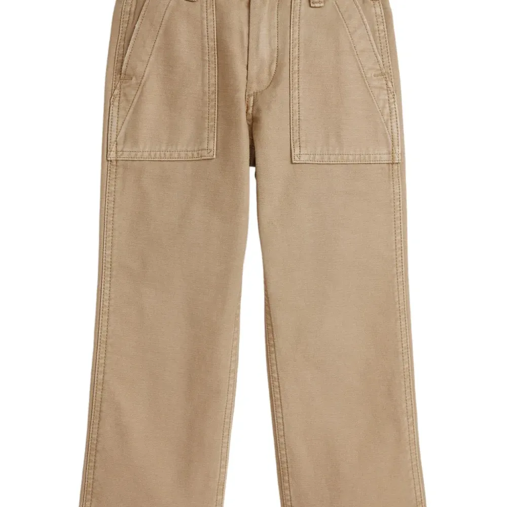 Брюки с карманами на пуговицах