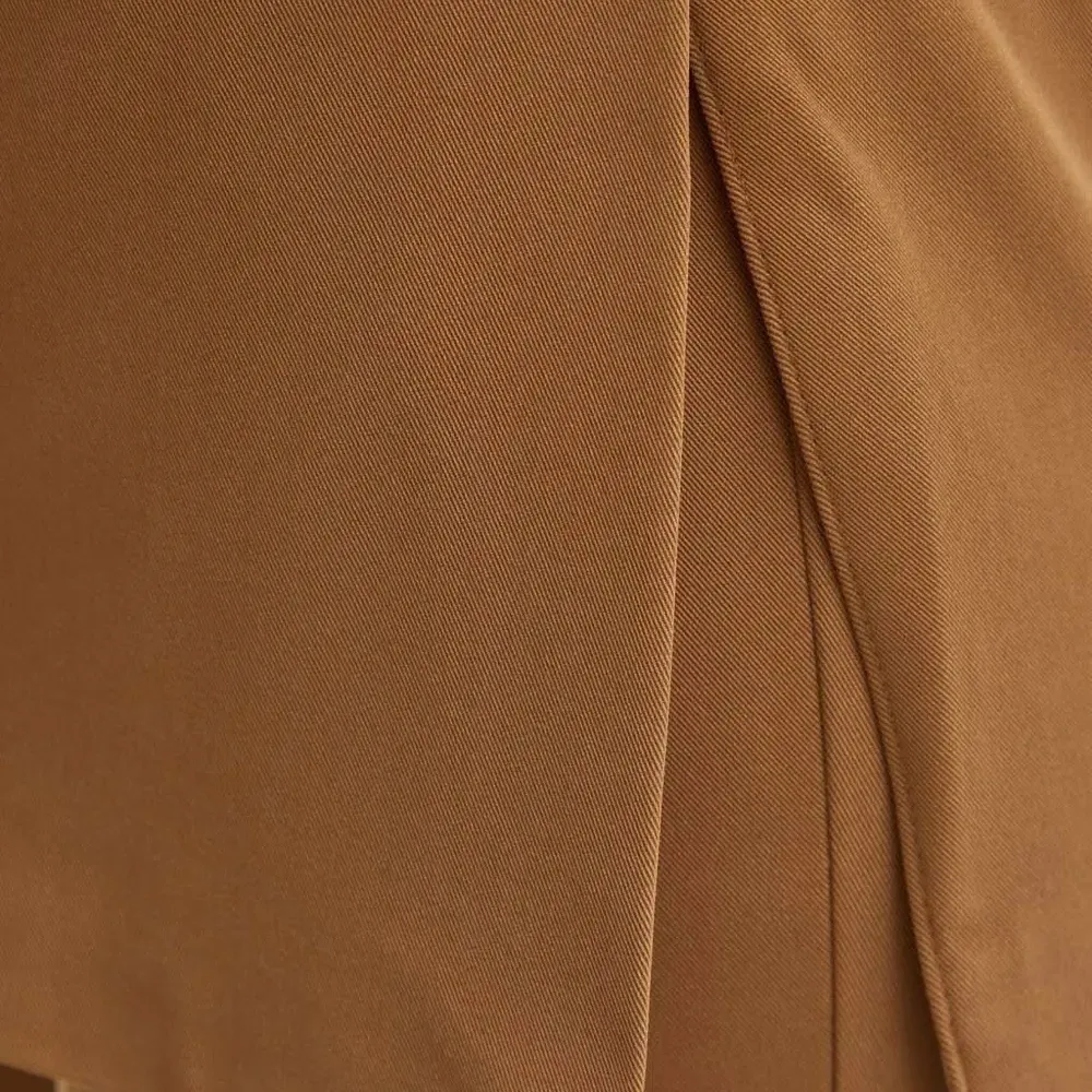 Блузка асимметричного кроя