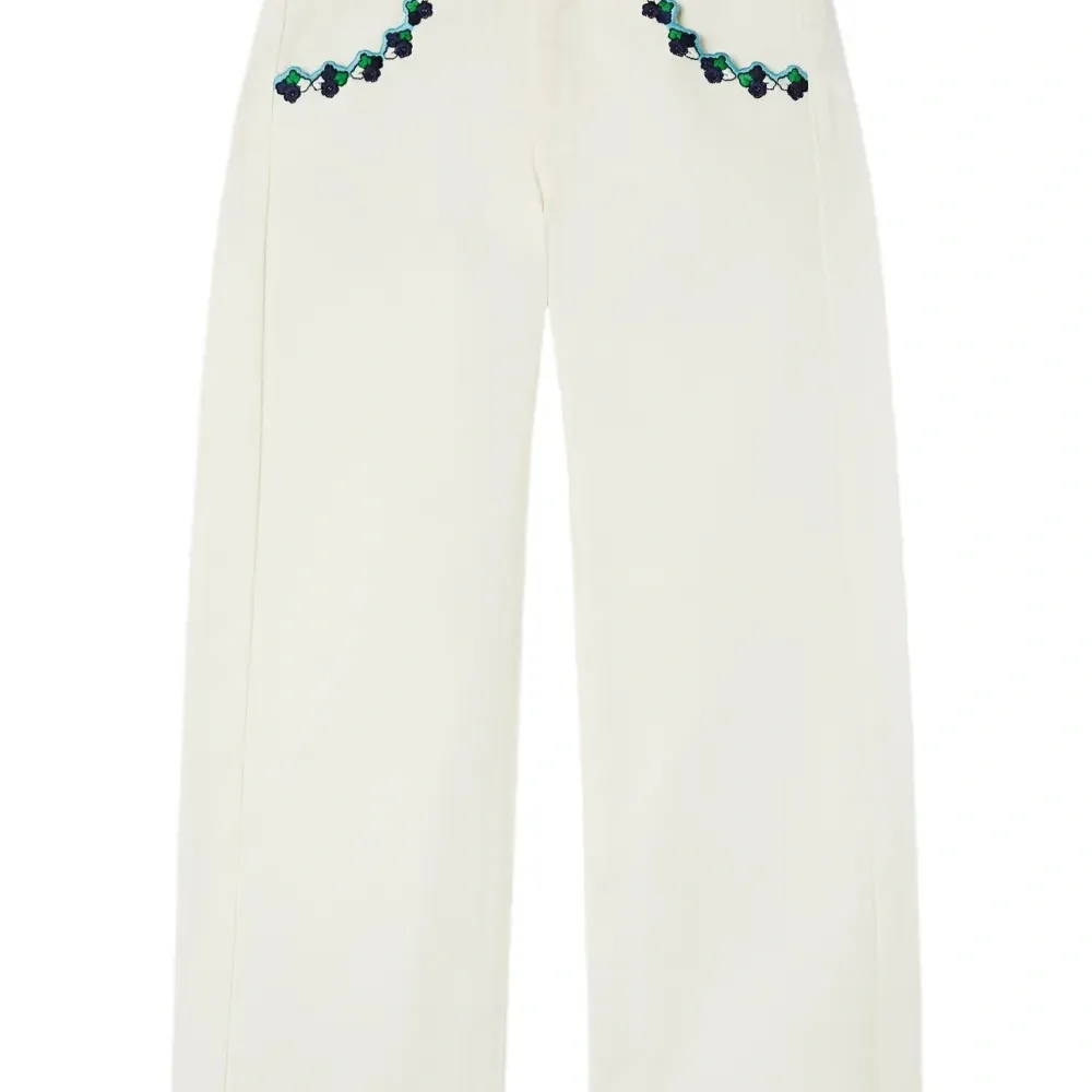 джинсы с вышивкой на карманах