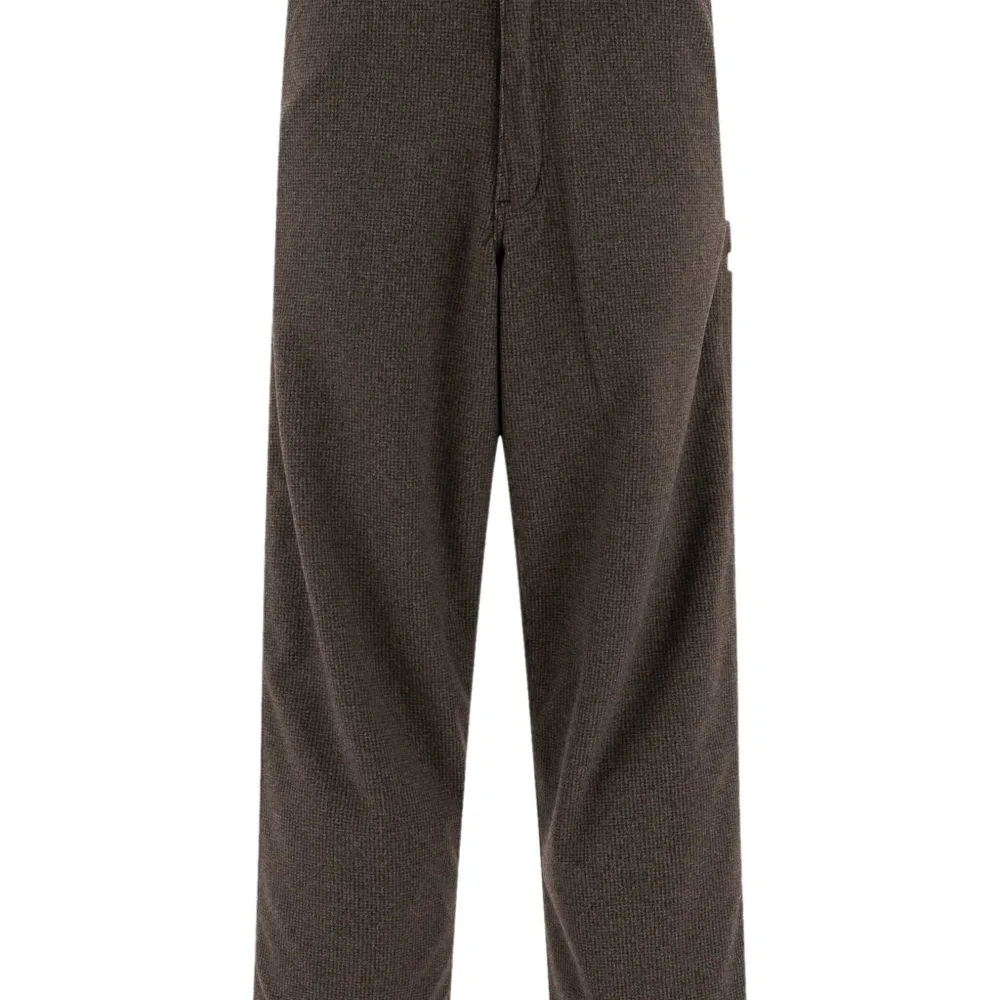 Брюки в ломаную клетку