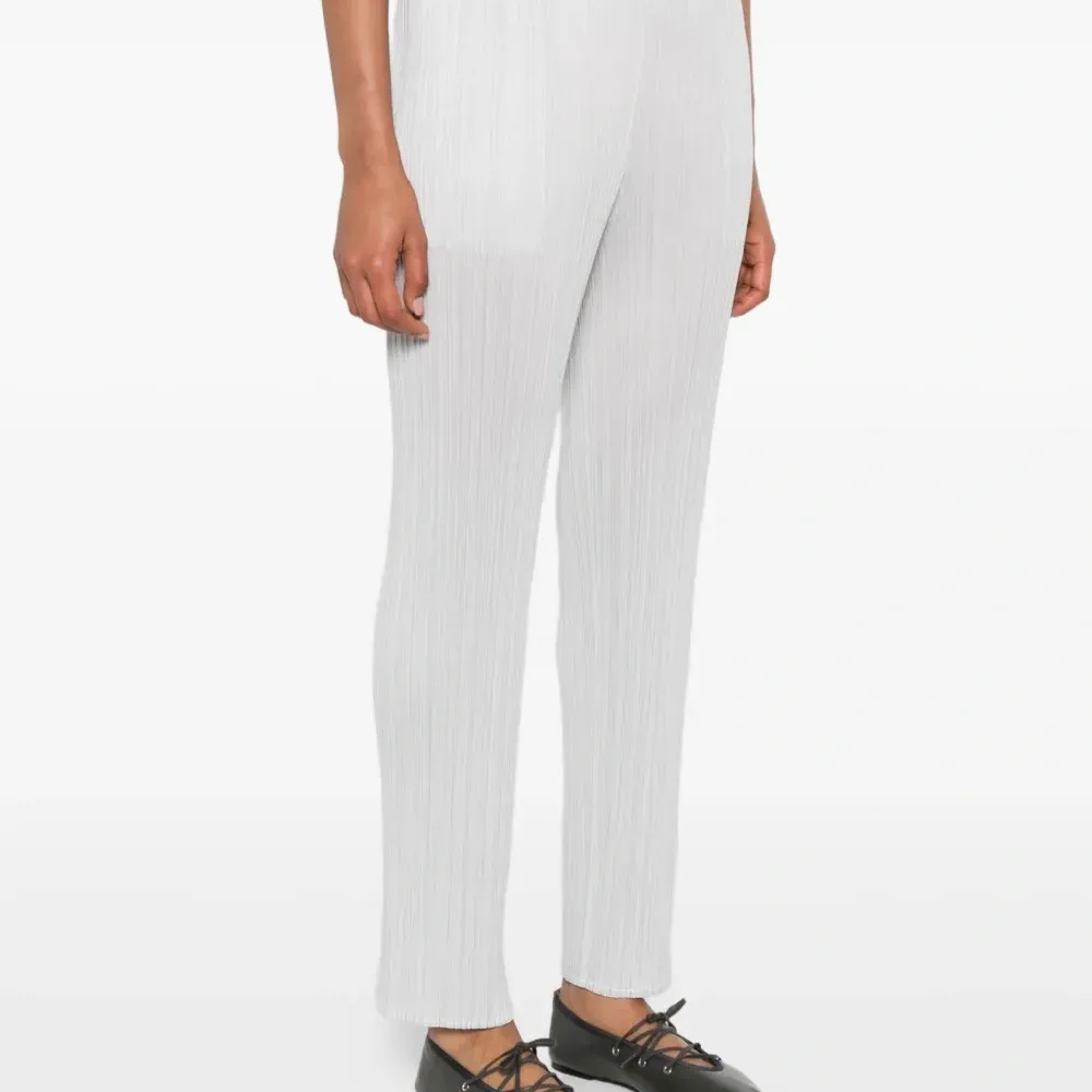 брюки со складками