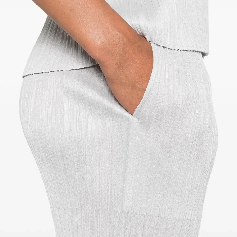 брюки со складками