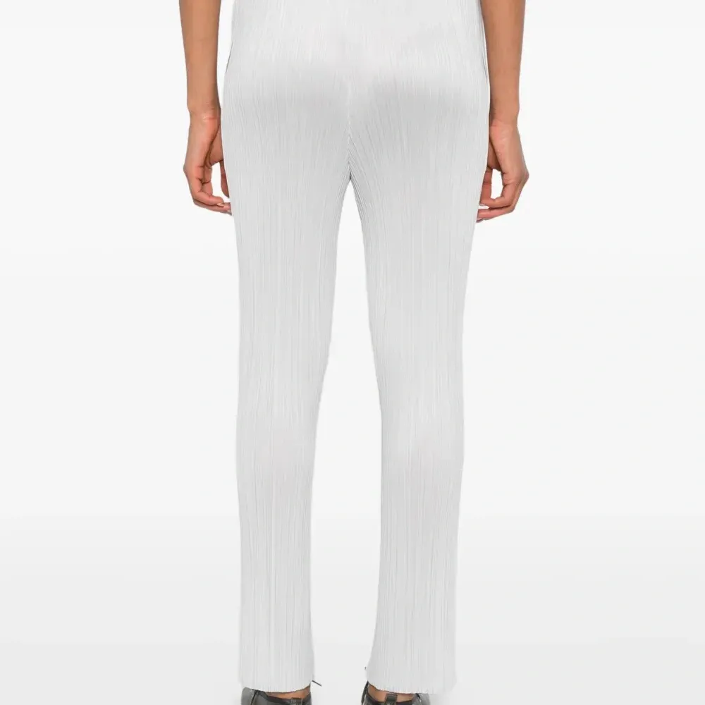 брюки со складками