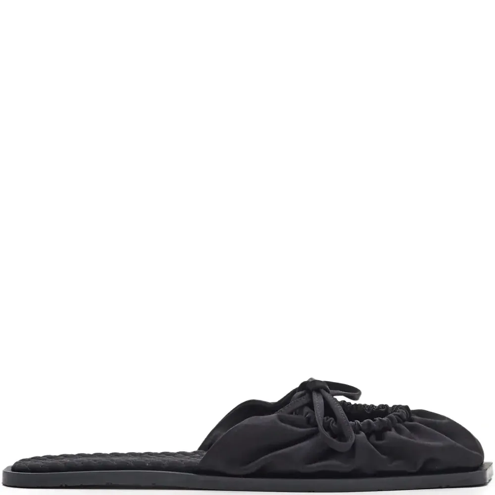 Мюли на плоской подошве с бантом