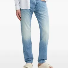 Джинсы с эффектом потертости