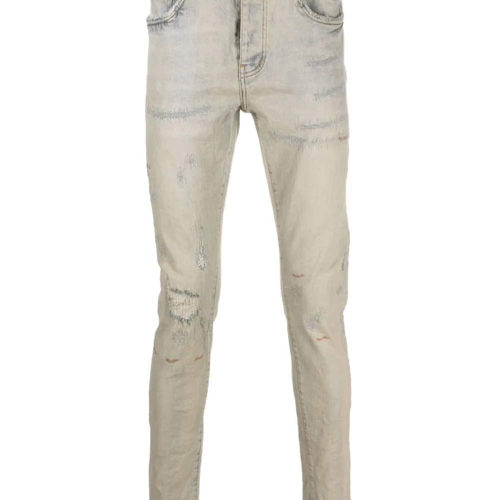 джинсы с эффектом потертости