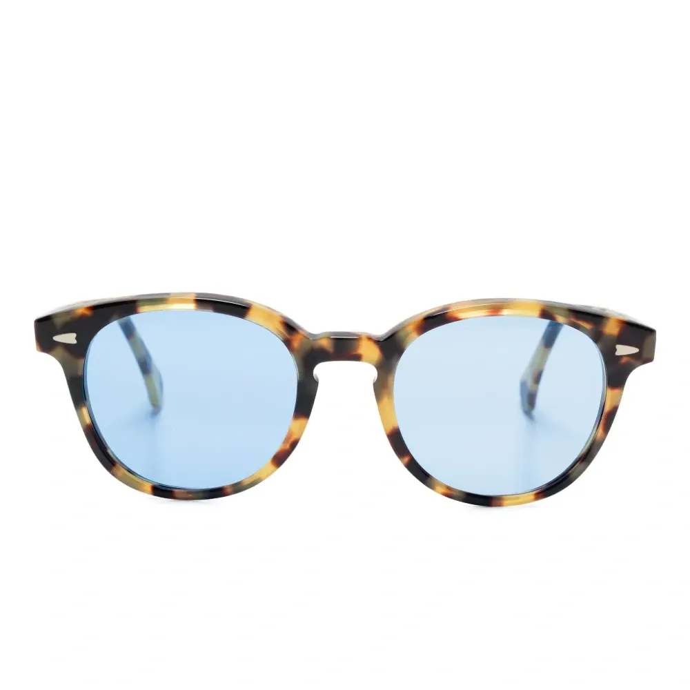 Круглые солнцезащитные очки в черепаховой оправе