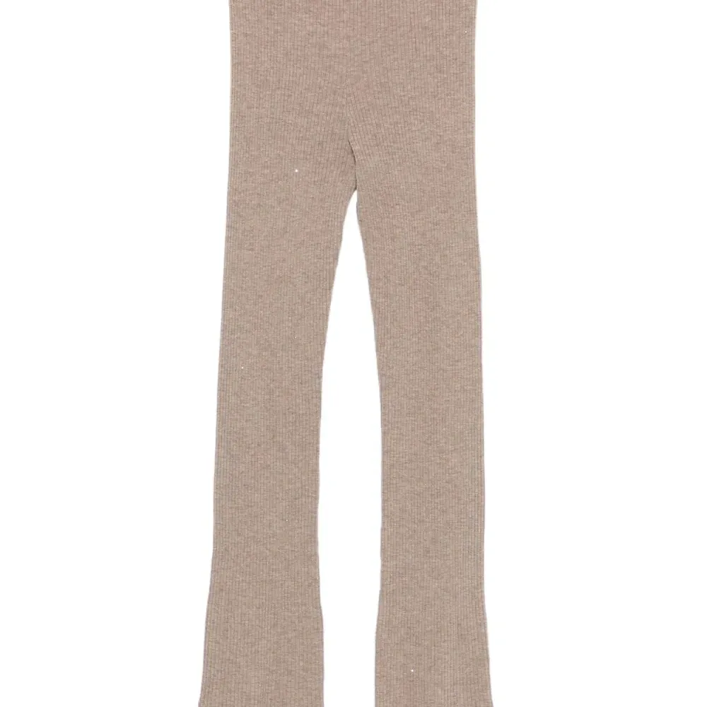 Расклешенные брюки в рубчик