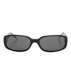 солнцезащитные очки в овальной оправе