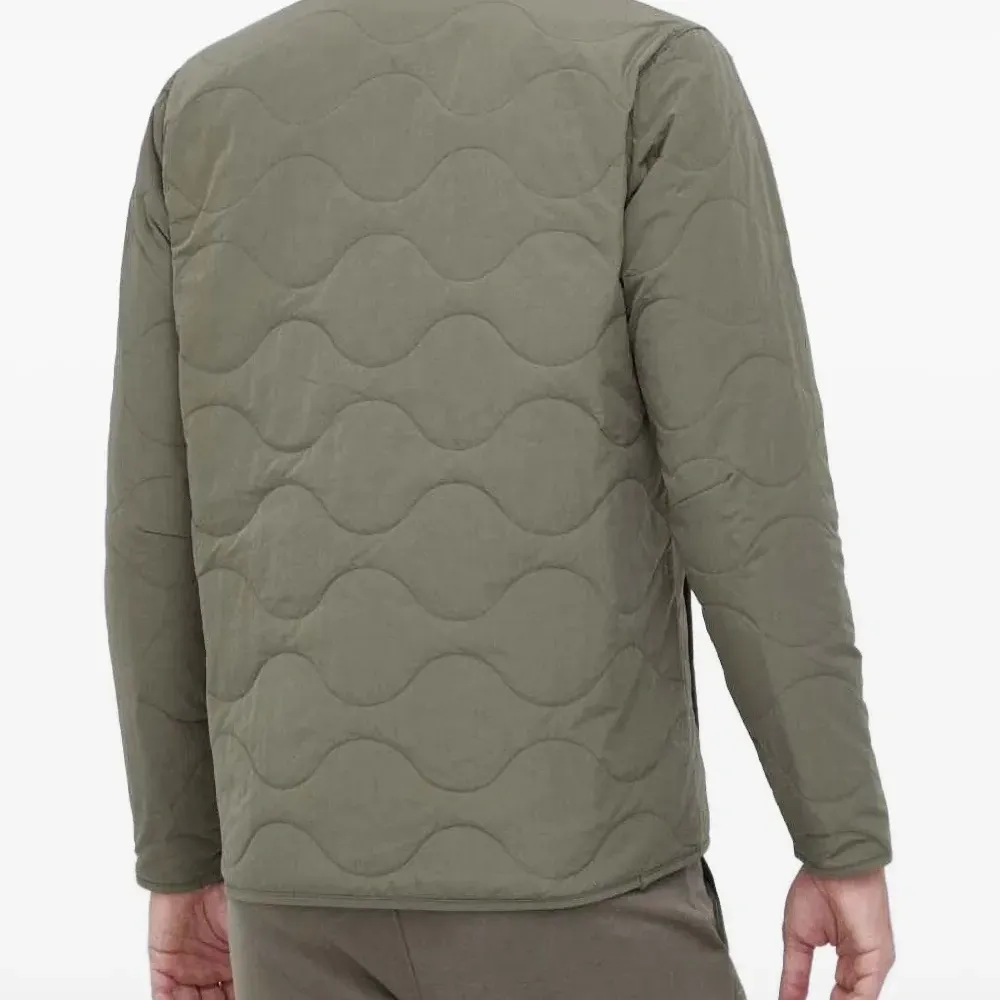 Стеганый пуховик на молнии