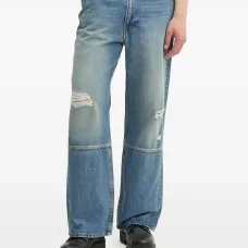 Джинсы с эффектом потертости