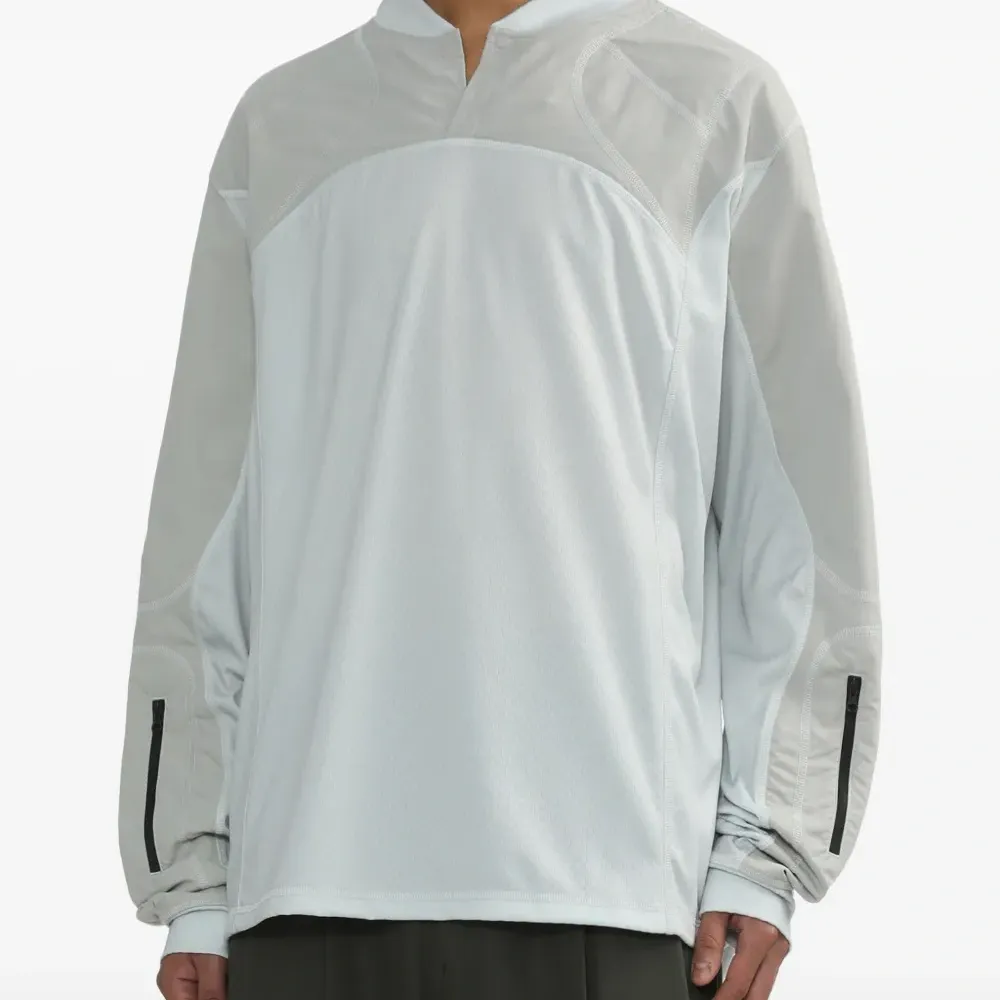 топ Combact с длинными рукавами