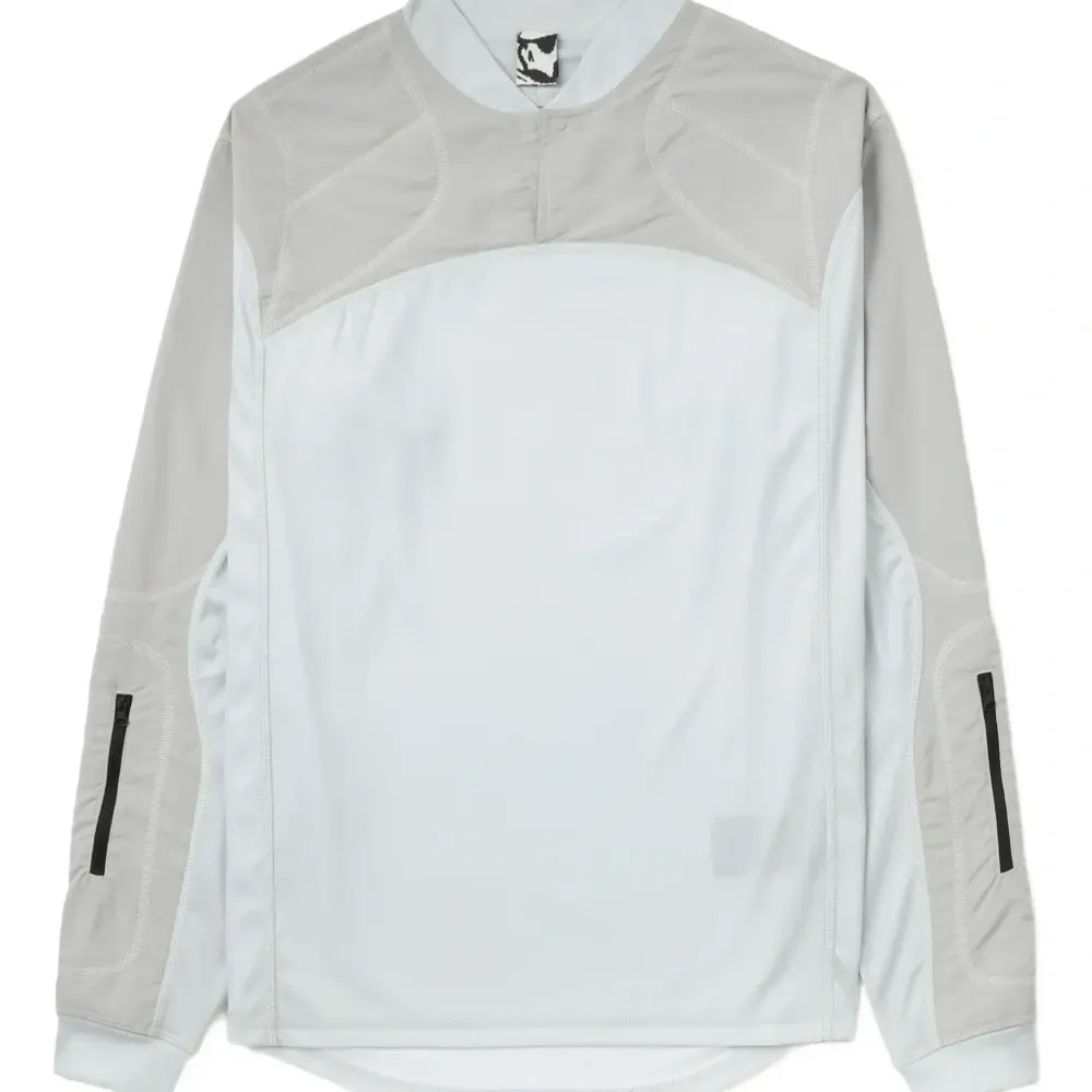 топ Combact с длинными рукавами