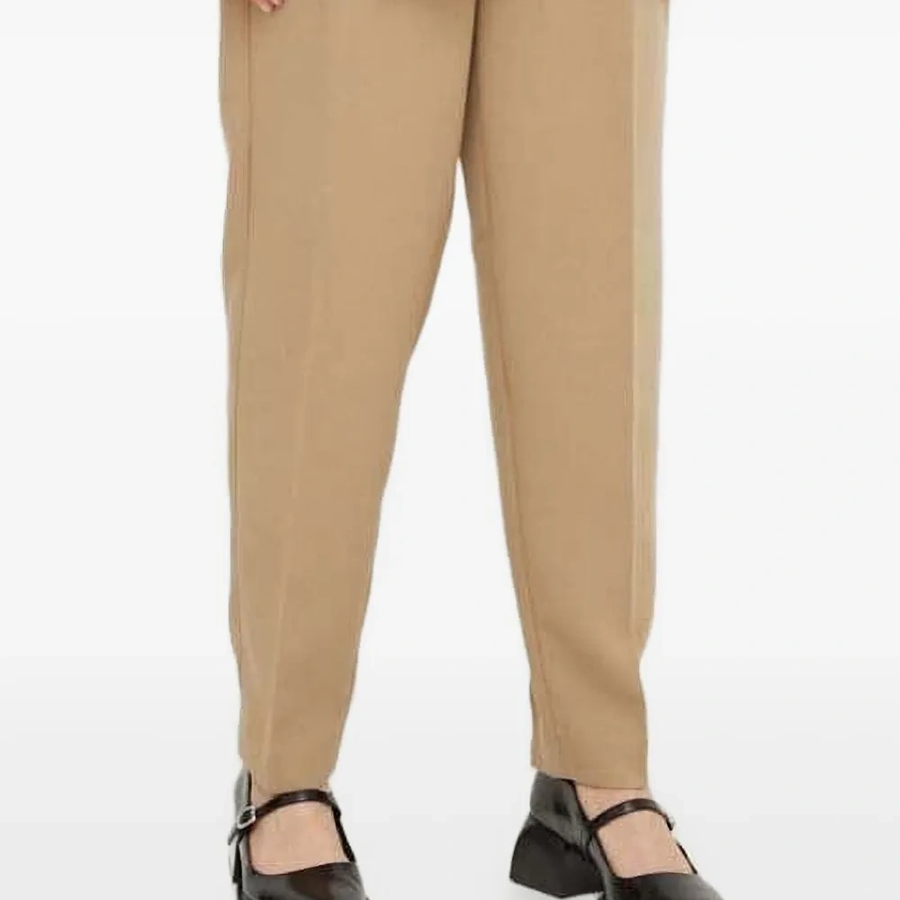 Брюки с завышенной талией и складками