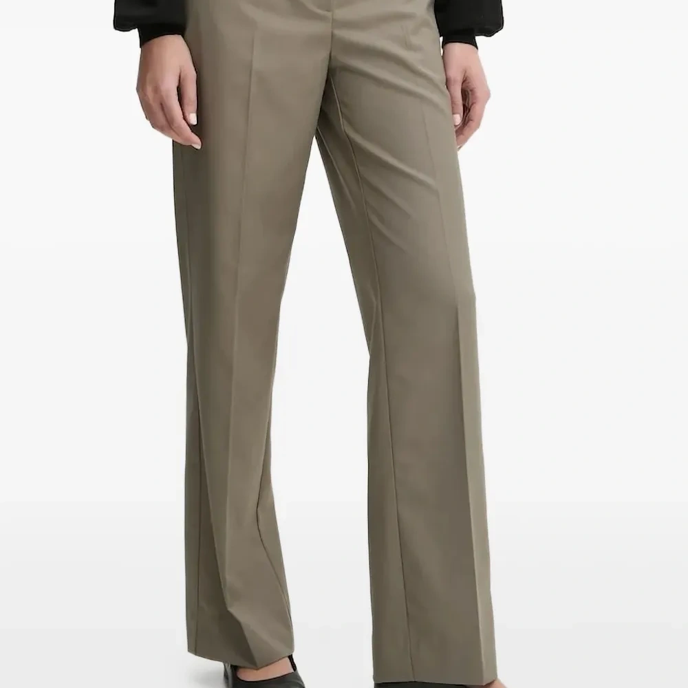 Брюки со складками