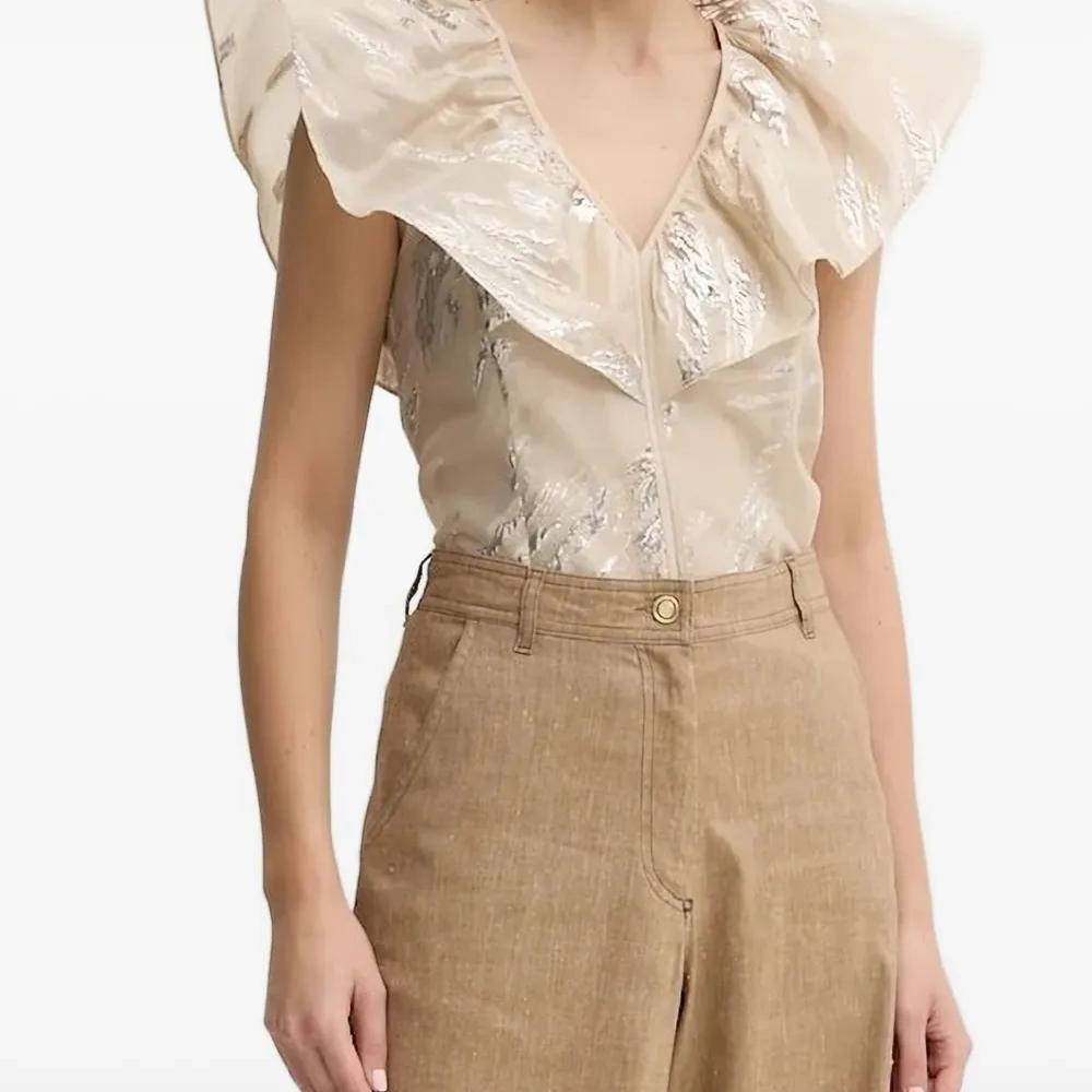 Блузка с оборками и эффектом металлик