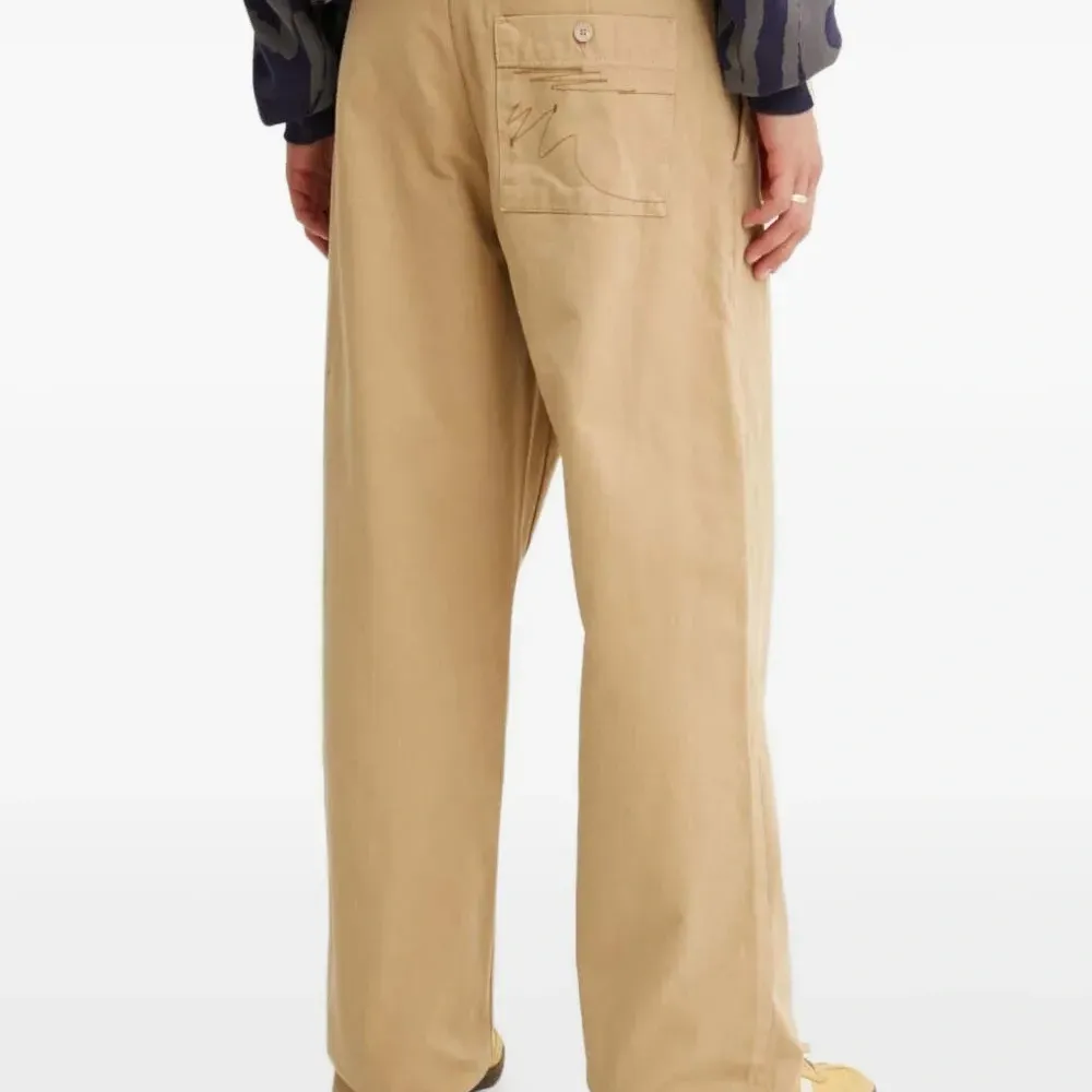 Брюки с вышивкой и карманами